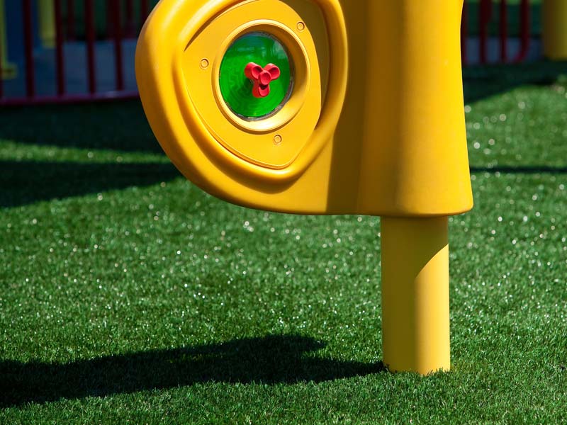 A close-up example of artificial playground turf.