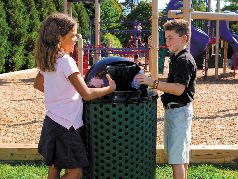 Example of a commercial trash can at a public playground