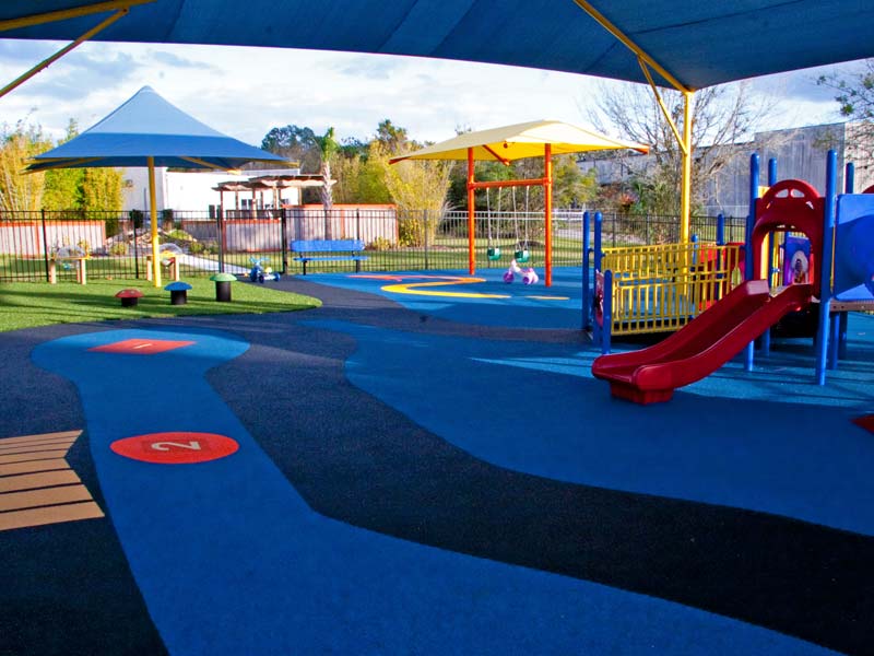 An example of colorful poured-in-place rubber playground surfacing
