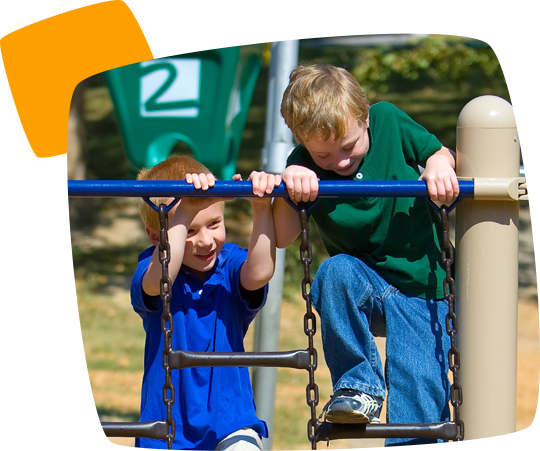 boys climbing metal chain ladders