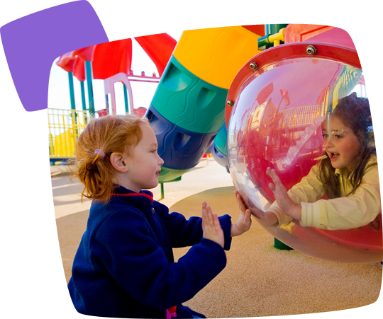 girls playing patty-cake in a byo playground