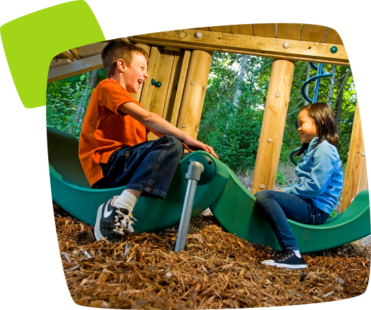 kids playing on a teeter-totter toy